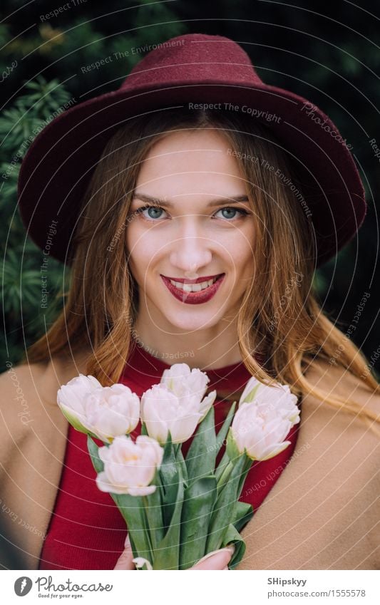 Pretty woman standing with white flowers Elegant Happy Beautiful Skin Face Make-up Spa Summer Human being Girl Woman Adults Lips Nature Sky Flower Fashion Hat