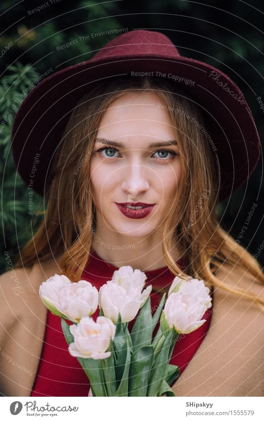 Pretty woman standing with white flowers Elegant Happy Beautiful Skin Face Make-up Spa Summer Human being Girl Woman Adults Lips Nature Sky Flower Fashion Hat