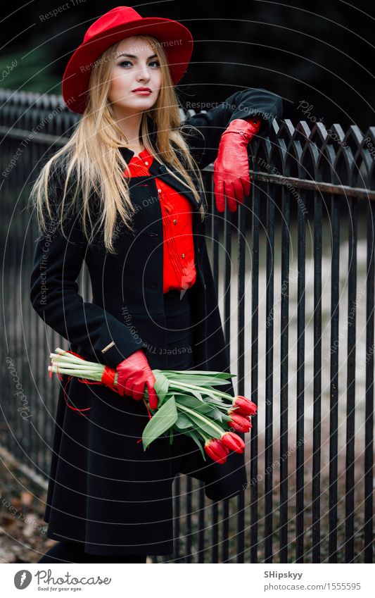 Woman standing on the park background with flowers Elegant Style Beautiful Garden Human being Girl Adults Nature Weather Flower Tulip Park Fashion Clothing