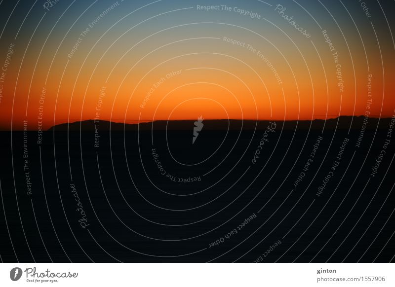 Colorful sunset Beautiful Ocean Mountain Nature Horizon Weather Coast Beach Pacific Ocean Dark Yellow Orange Red Black Sunset Blur time of day Sky wiping effect