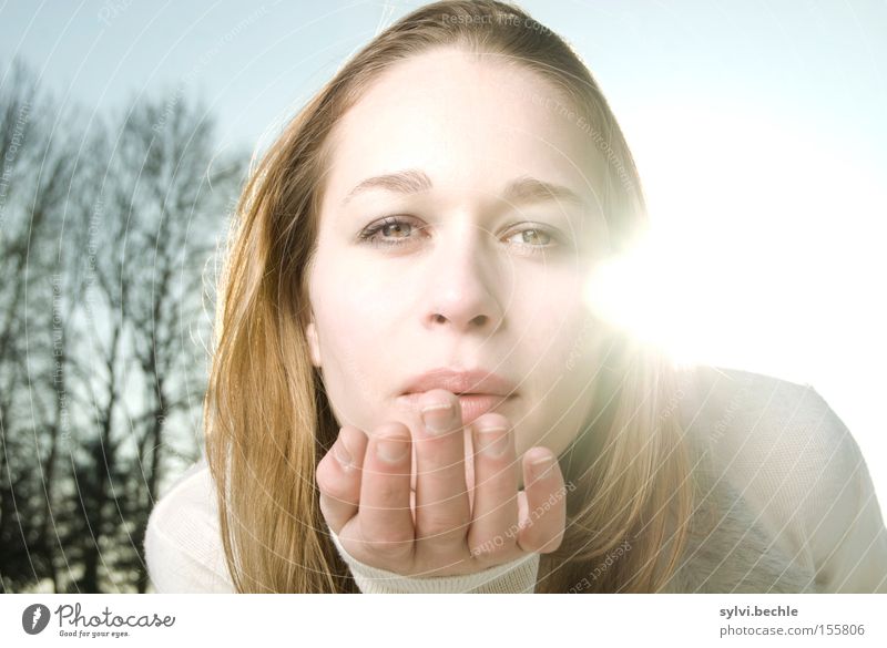 in the light II Beautiful Sun Winter Woman Adults Mouth Hand Nature Tree Breathe Touch Kissing Blow Smooth Lighting Alluring Caresses Snow Blonde Pout Lovely