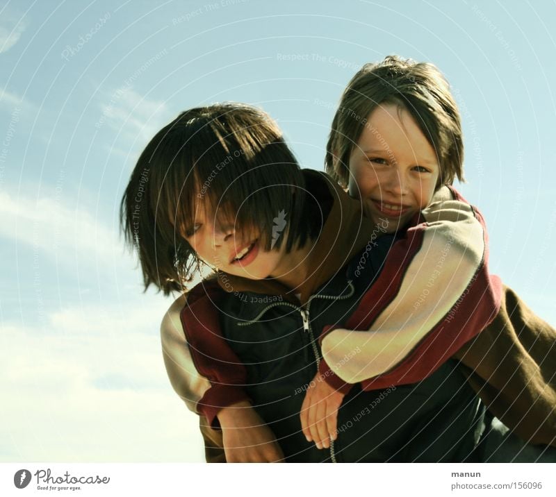 Brothers I Colour photo Subdued colour Exterior shot Copy Space left Copy Space top Neutral Background Day Light Contrast Sunlight Deep depth of field