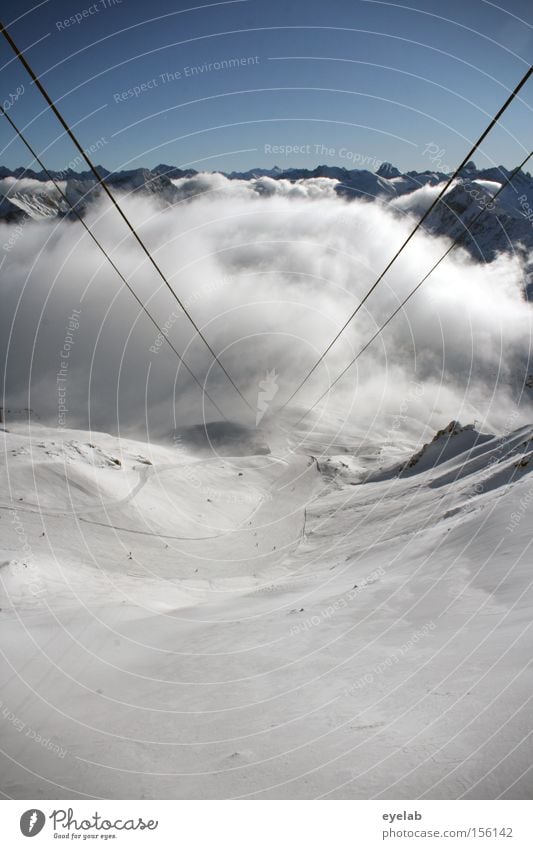 Suspended clouds Mountain Valley Sky Clouds Rock Winter Vantage point Far-off places Monumental Sublime Horizon Peak Alps Snow