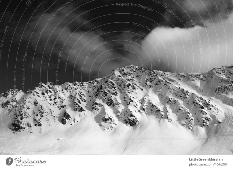 maintäli Mountain Mountain ridge Snow Rock Sky Clouds Black & white photo Parsenn Davos Ski resort Light Shadow Switzerland Winter monasteries