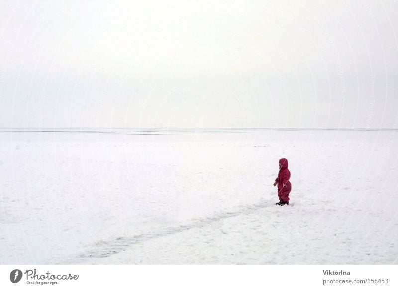 ice desert Snow Ice Cold Lake Balaton Doomed Loneliness Child Small Masked Snowsuit Tracks Desert Fear Patch of colour Winter Lost