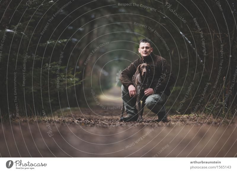 Man with dog at the forest road Leisure and hobbies Hunting Trip To go for a walk Walk the dog Human being Masculine Young man Youth (Young adults) Friendship