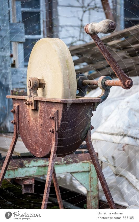 An old, rusty grinder Home improvement Craft (trade) Unemployment Retirement Grinder grindstone Tool Machinery Crank Scrapyard Stone Metal Steel Rust Rotate Old