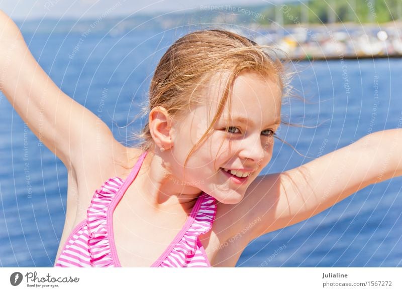 Dancing girl on the riverbank Joy Playing Summer Beach Ocean Child Schoolchild Girl Woman Adults Infancy 1 Human being River bank Blonde Movement Smiling Pink