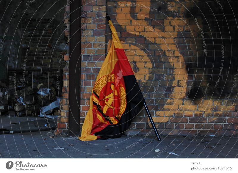 End of the journey Berlin Town Capital city Downtown Old town Industrial plant Ruin Sign Flag GDR Colour photo Interior shot Copy Space left Copy Space right