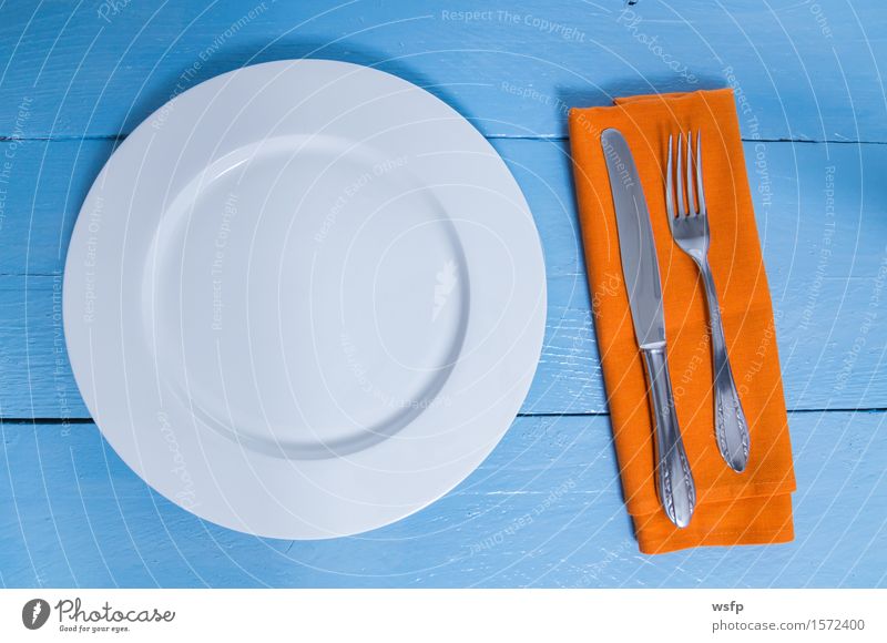 Cutlery and plate on blue wood background Plate Fork Kitchen Restaurant Gastronomy Old Blue Empty Napkin Knives Wooden board Orange Wooden table Wooden sign