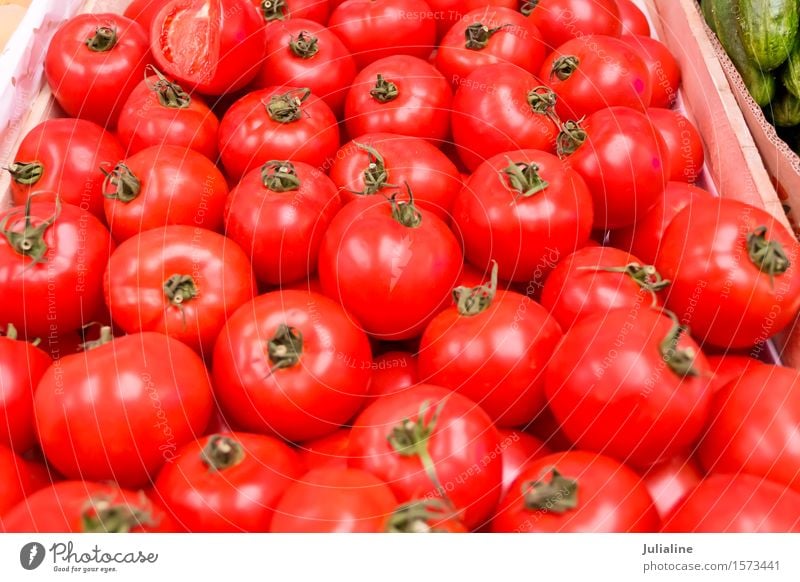 Background with fresh red tomatos Vegetable Vegetarian diet Fresh Yellow Red Tomato food healthy ripe Raw Organic Colour photo