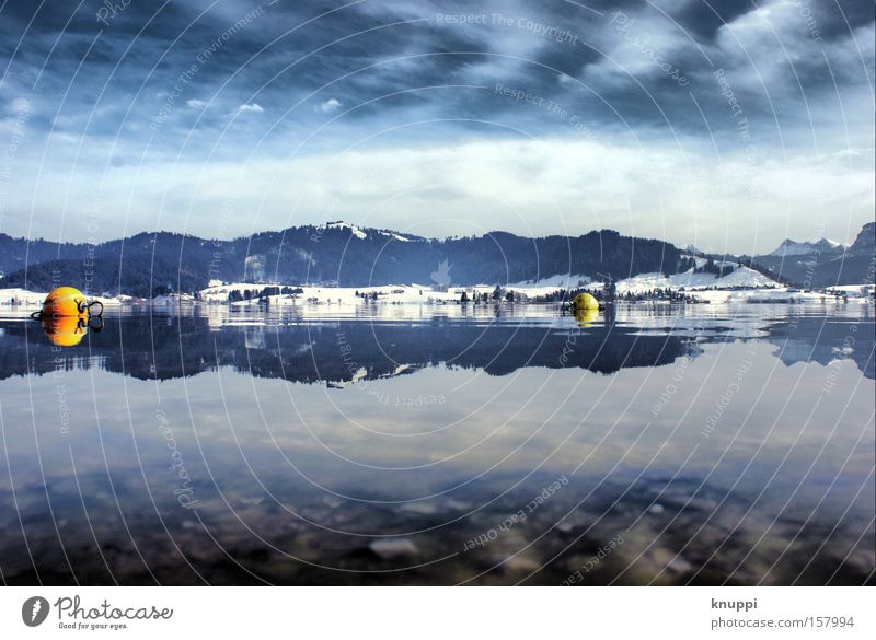 Winter Wonder Lake Snow Mountain Landscape Water Sky Clouds Hill Alps Cold Blue Buoy Swiss Alps Switzerland Colour photo Multicoloured Deserted Copy Space top