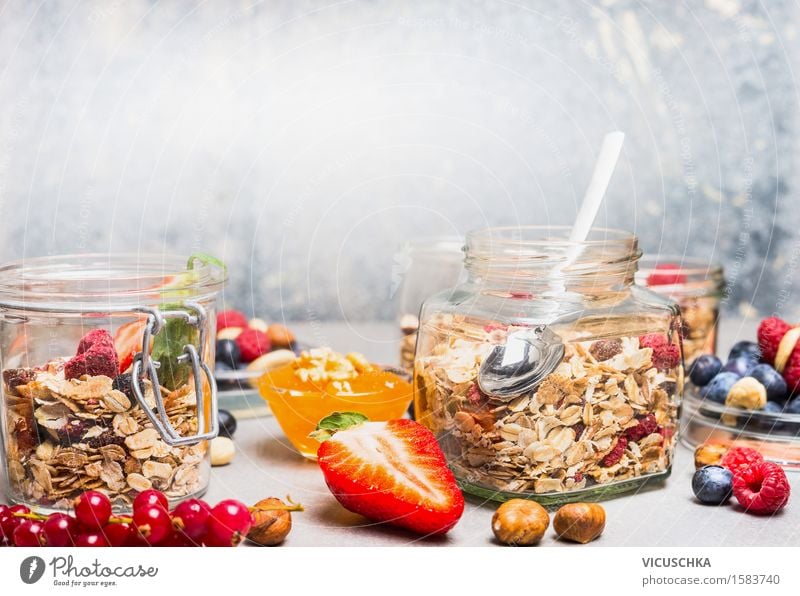 Muesli in glass with berries and nuts Food Fruit Grain Dessert Nutrition Breakfast Organic produce Vegetarian diet Diet Glass Spoon Lifestyle Style