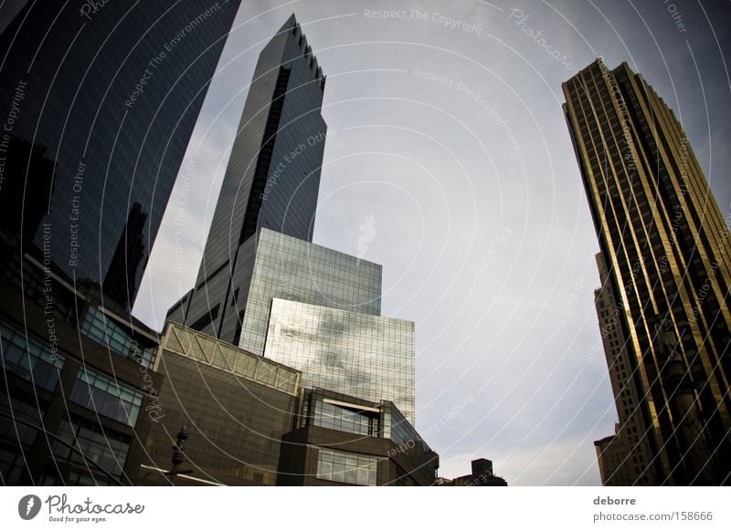 Looking up at the New York City skyline. Sky Clouds Town Capital city High-rise Famousness Success Fantastic Rich Gold Gray Decadence USA Colour photo