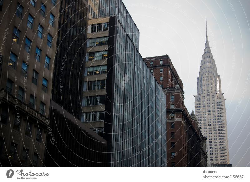 Looking up at buildings in New York City with the Chrysler Building in the background. Sky Town Capital city Downtown Populated Overpopulated