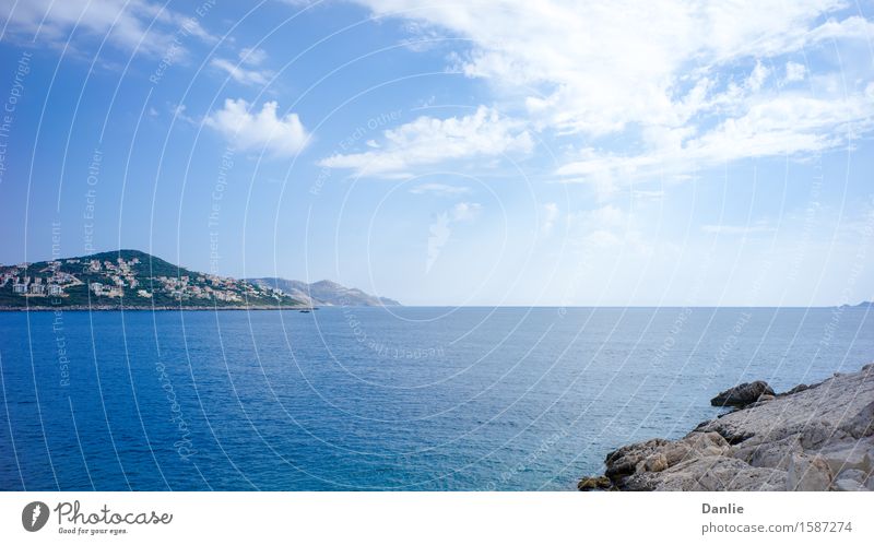 Kas Peninsula in between Aegean Sea and Blue Sky in Summer Vacation & Travel Ocean Clouds Rock Building Street 16:9 the Aegean D400 Turkey attractions Blue sky