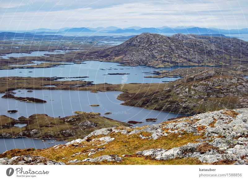 rugged landscape Landscape Elements Earth Water Bad weather Hill Rock Bog Marsh Lake Adventure Irritation Scotland Western islands uist holes Gloomy fissured