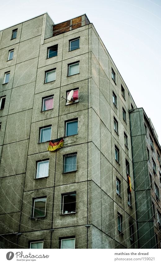 GERMAN LEITKULTUR Architecture Prefab construction Window Line Crazy Dark Gray Dismissive Flag Germany German Flag Federal eagle Pride Patriotism Berlin Dirty