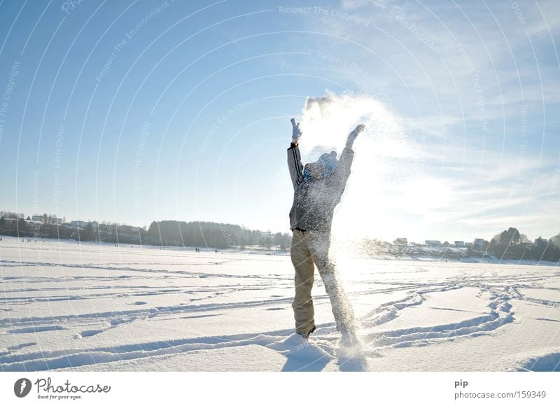 snow flurries Joy Playing Trip Freedom Sun Winter Snow Winter vacation Human being Arm Legs 1 Sky Beautiful weather Freeze Stand Romp Throw Bright Cold Blue