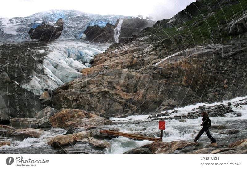 by leaps and bounds Glacier Ice Woman Jump Blue Norway Hiking Vacation & Travel Stone Mountain Water Threat Snow Red Signs and labeling Footpath Cold