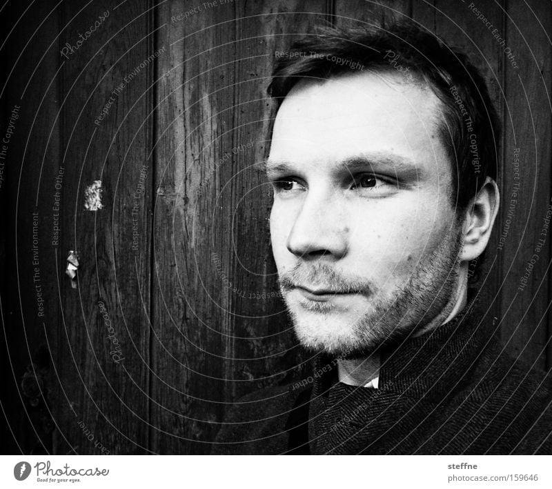 . Man Portrait photograph Face Wooden wall Think Earnest Pride Sublime Reliability Designer stubble Black White