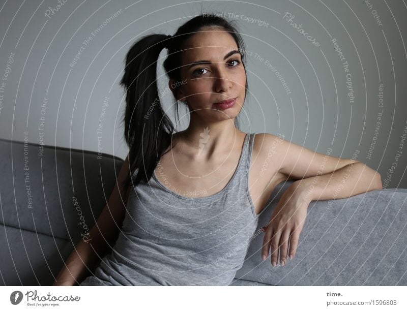 GizzyLovett Living or residing Furniture Sofa T-shirt Black-haired Long-haired Braids Observe Think Looking Wait Beautiful Feminine Emotions Moody