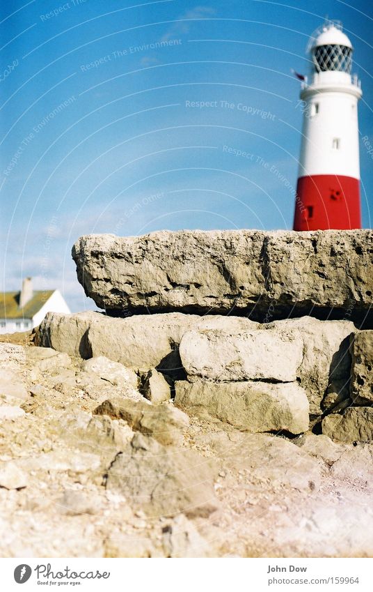 Smuggler's Coast Colour photo Sunlight Deep depth of field Vacation & Travel Trip Summer Ocean Living or residing Rock Reef Harbour Lighthouse Architecture