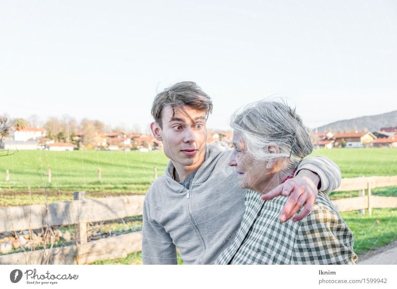 young man and old woman going for a walk Care of the elderly Apprentice Health care To talk Young man Youth (Young adults) Female senior Woman Grandmother