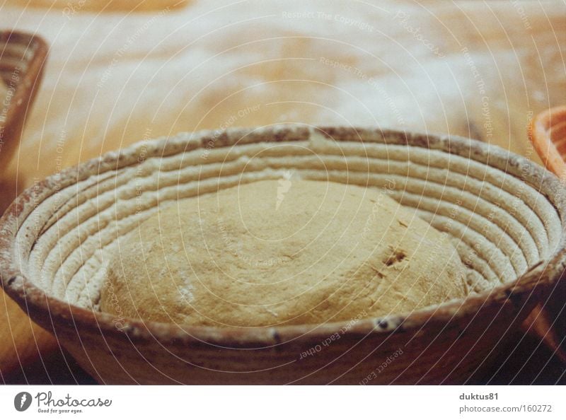 Soon we'll be in the oven. Baker Bakery Bread Dough Basket Flour Baked goods Nutrition Raw Baking Containers and vessels Shallow depth of field Delicious Fresh