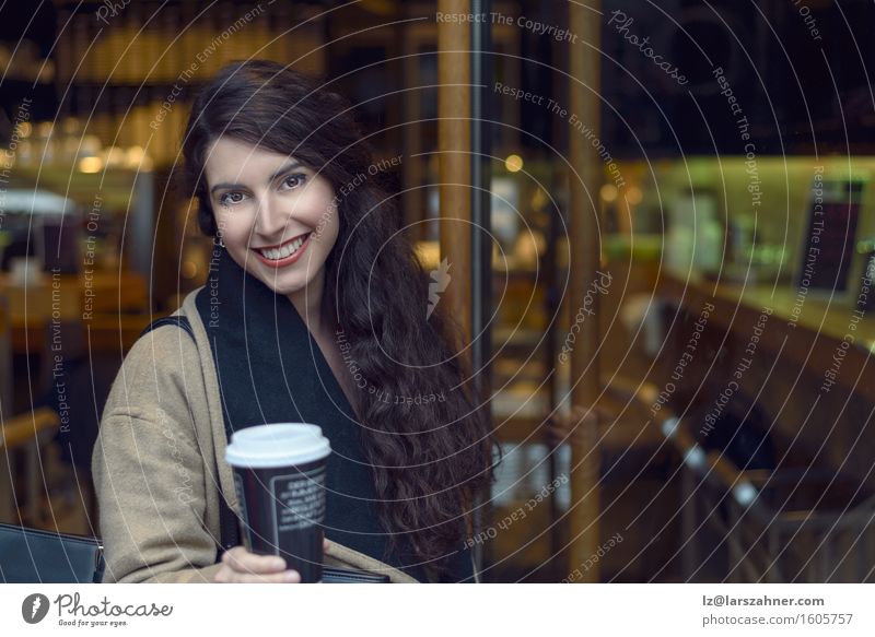 Young brunette woman leaving a coffee bar Beverage Drinking Coffee Restaurant Feminine Woman Adults 1 Human being 18 - 30 years Youth (Young adults) Jacket