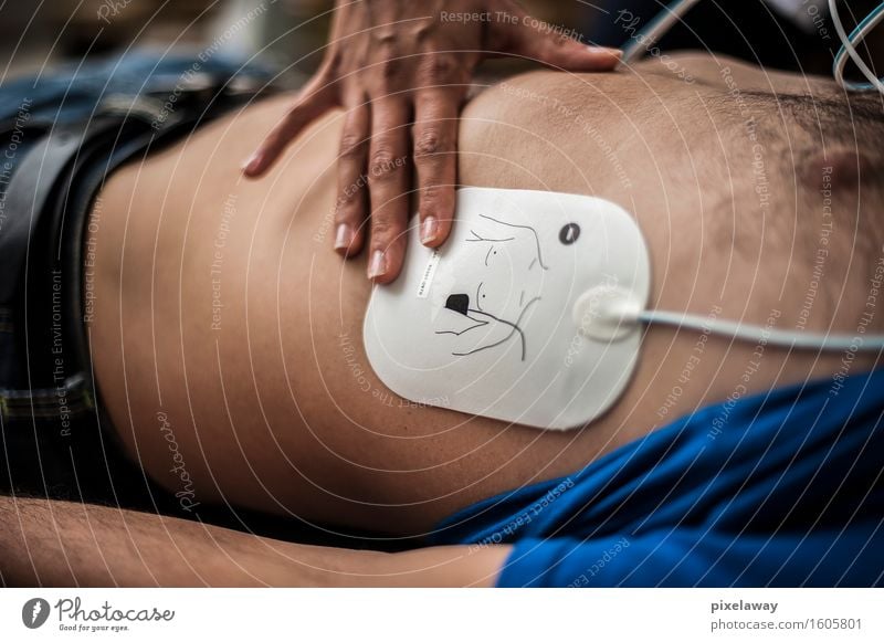 rescuer applying defibrillator pad Healthy Health care Medical treatment Human being resuscitation cpr aed cardiopulmonar resuscitation cardiac massage