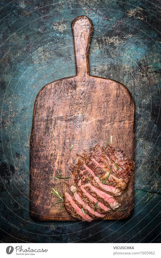 Sliced grilled steak on old chopping board Food Meat Nutrition Dinner Picnic Organic produce Healthy Eating Table Kitchen Restaurant Barbecue (apparatus) Design