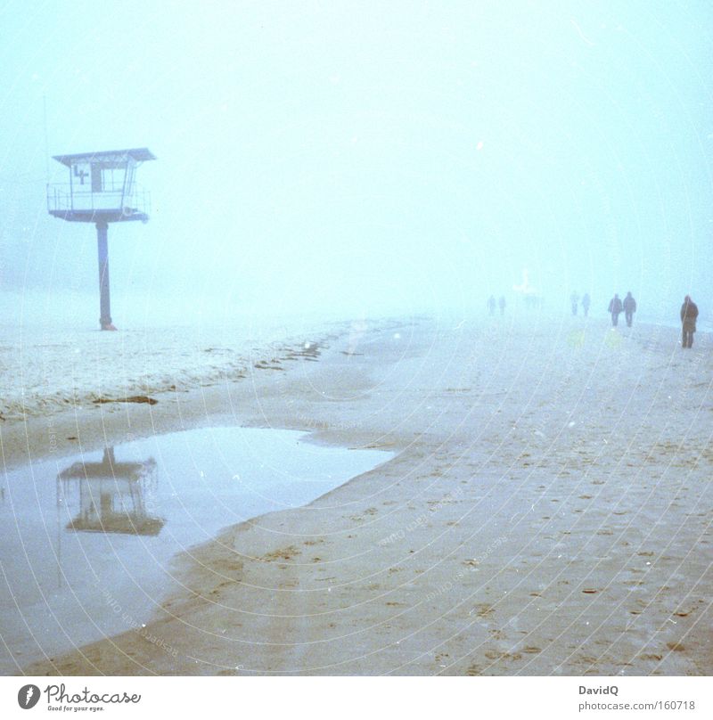 beach walk Beach Coast Sand Ocean Baltic Sea Tower Lifeguard Medic Fog To go for a walk Puddle Human being Reflection Winter Group