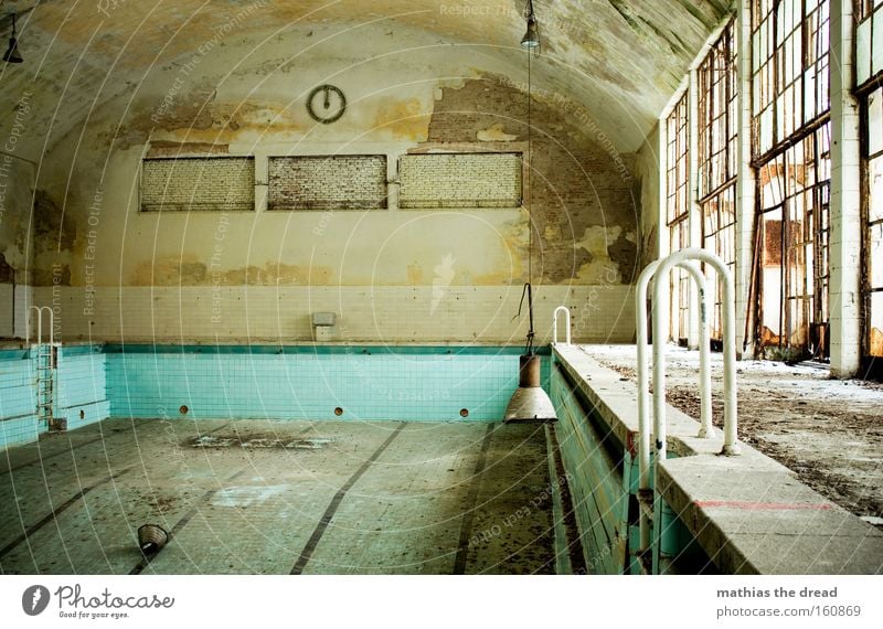 indoor swimming pool Indoor swimming pool Swimming pool Empty Gloomy Dirty Leaf Hall Clock Lamp Glazed facade Derelict Aquatics Grief Distress Non-swimmer