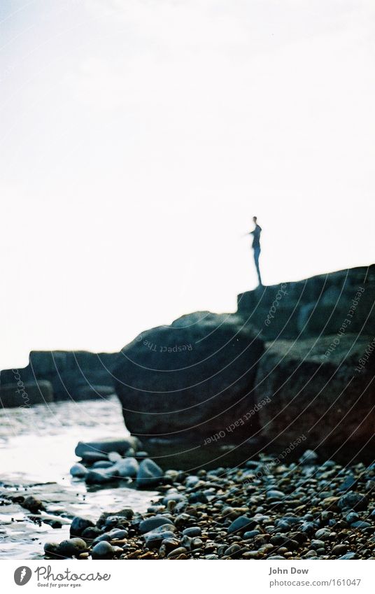 Homage to Giacometti Life Vacation & Travel Adventure Far-off places Freedom Beach Ocean 1 Human being Water Rock Coast Bay Stone Wait Thin Longing Wanderlust