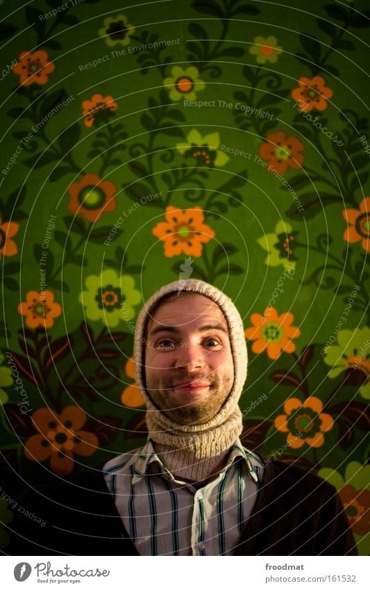 flower child Lighting Illuminate Hippie Man Facial hair Laughter Smiling Grinning Joy Flower Wallpaper Portrait photograph Funny Humor Cap Hooded (clothing)