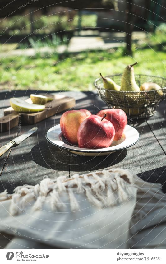 Sliced apples on a plate. Fruit Apple Nutrition Eating Diet Plate Garden Table Nature Flower Blossom Wood Fresh Juicy Green Red food Pear healthy sweet ripe