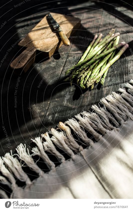 Asparagus on vintage table Vegetable Nutrition Vegetarian diet Diet Table Kitchen Wood Dark Fresh Delicious Green background Organic food healthy Raw