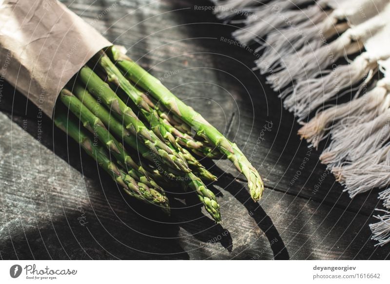 Asparagus on vintage table Vegetable Nutrition Vegetarian diet Diet Table Kitchen Wood Dark Fresh Delicious Green Organic Raw Ingredients Meal Rustic Gourmet