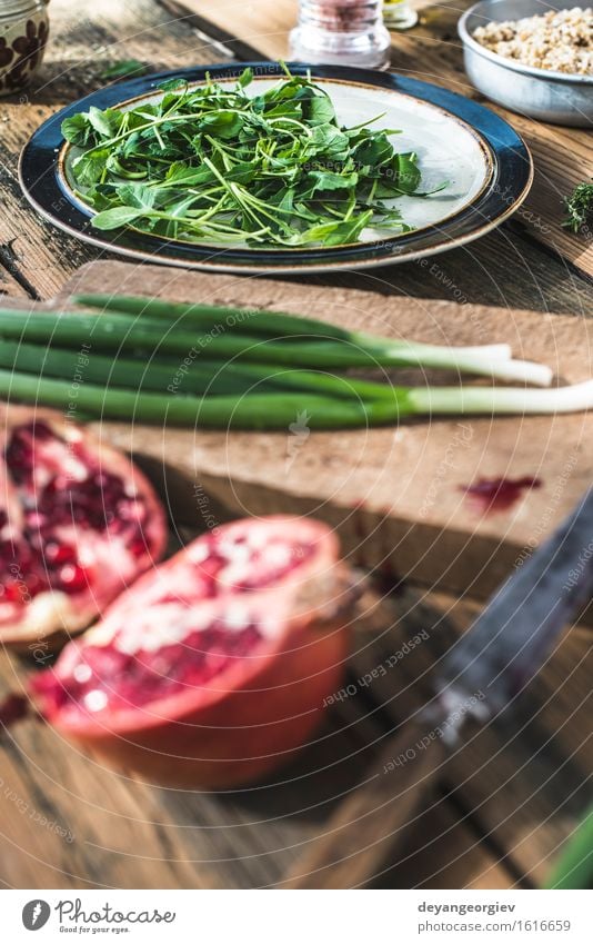 Green salad with pomegranate, manna croup, onion. Cheese Vegetable Nutrition Eating Lunch Dinner Vegetarian diet Diet Plate Bowl Kitchen Fresh Red Black White