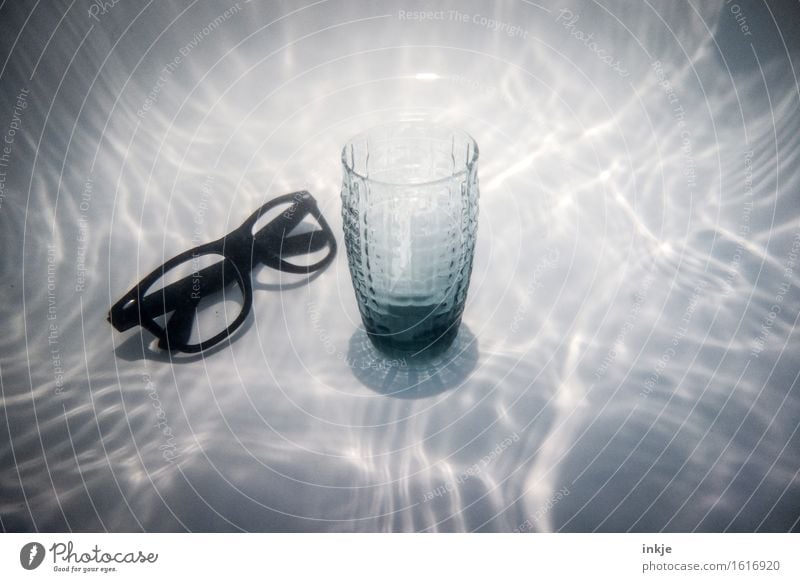 A glass of water from Tlön Nutrition Beverage Drinking water Glass Eyeglasses Water Exceptional Whimsical Surrealism Water reflection Still Life Colour photo