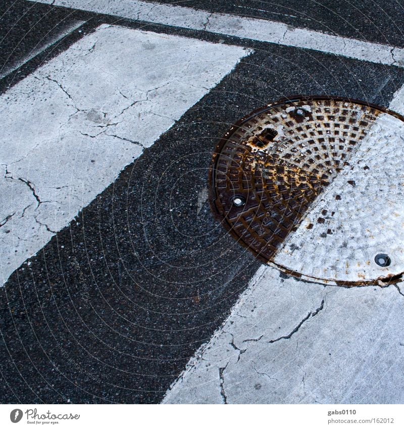 yin-yang Gully Zebra crossing Yin and Yang Street Channel Subsoil Half Stripe Contrast Pedestrian Intersection Black & white photo Wet Street sign