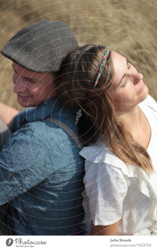 Couple in ethno wedding look Woman Adults Man Partner 2 Human being 30 - 45 years Shirt Blouse Hat Cap Hairband Brunette Long-haired To enjoy Sit Dream