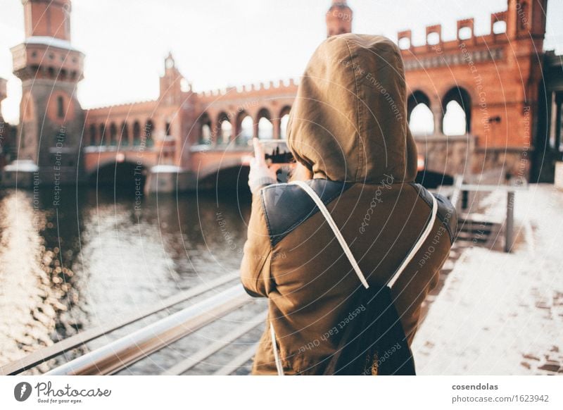 Young woman taking a picture of a bridge Lifestyle Vacation & Travel Sightseeing City trip University & College student Cellphone PDA Internet Feminine