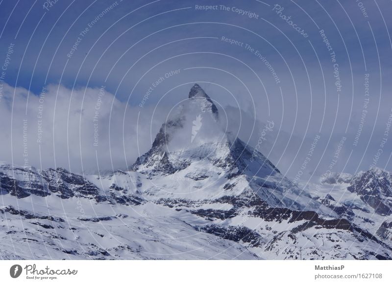 Matterhorn | Zermatt in Switzerland Tourism Adventure Far-off places Sightseeing Winter Snow Winter vacation Mountain Nature Landscape Sky Clouds