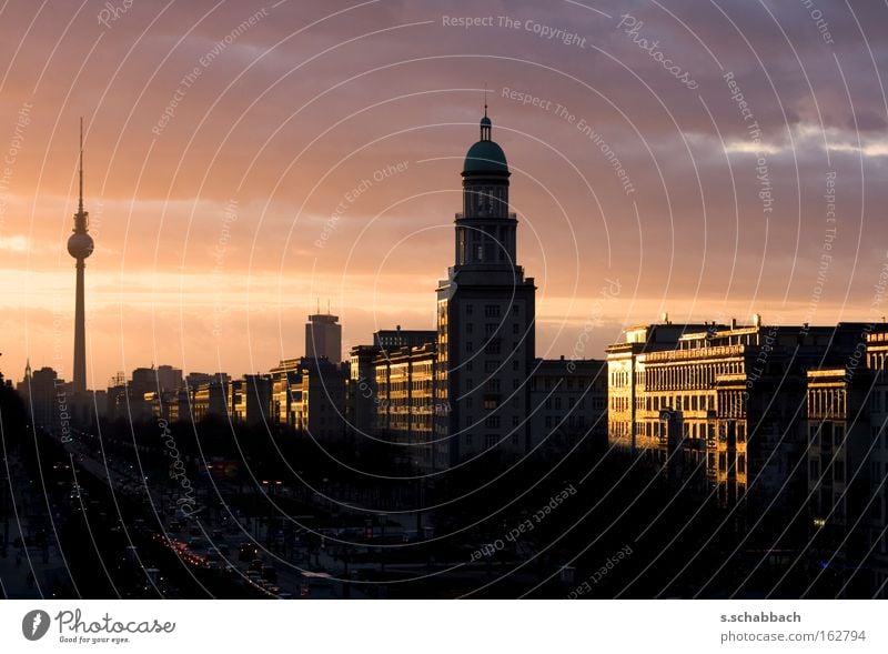 Berlin sunset Sunset Silhouette Frankfurter Tor Television tower Dusk Frankfurter Allee Karl-Marx-Allee Celestial bodies and the universe Long exposure sundown