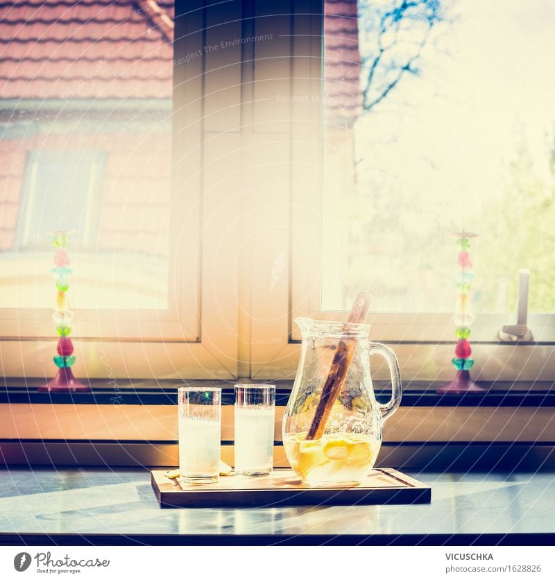 Two glasses and jug with lemonade on the kitchen table Food Fruit Nutrition Beverage Cold drink Lemonade Juice Longdrink Cocktail Glass Lifestyle Style