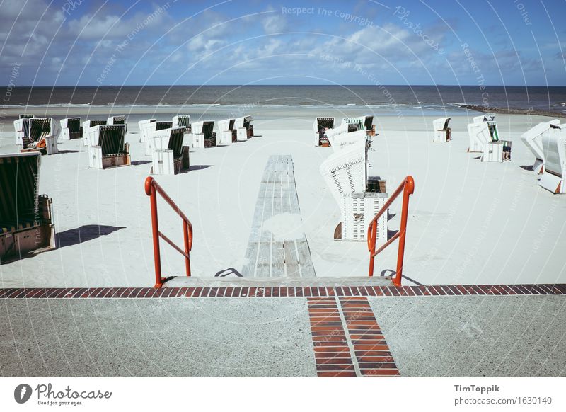 Enter Sand Environment Nature Landscape Water Sky Clouds Sun Summer Beautiful weather Waves Coast Beach North Sea Ocean Sea promenade Beach chair Banister