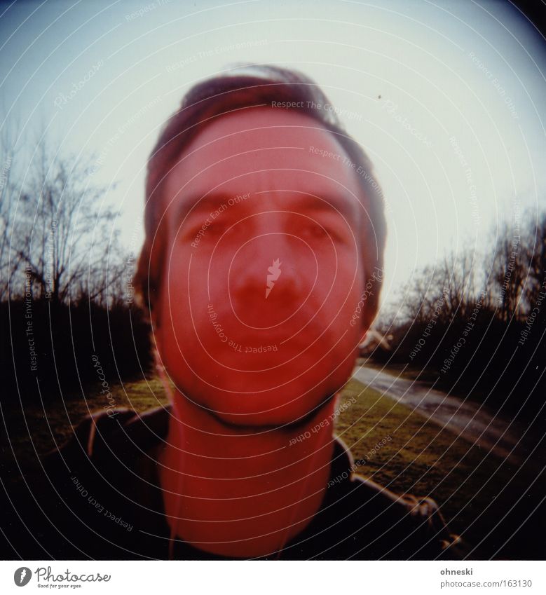 A man sees red Man Red Portrait photograph Skeptical Doubt Holga Analog Blur Anger Aggravation Lomography ohneski