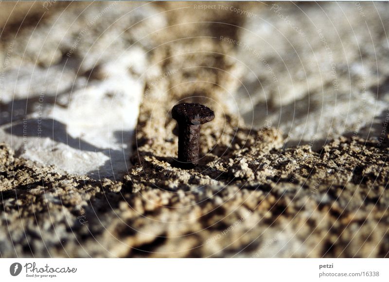 nail Nail Large Rust Wall (barrier) Mortar Plaster Light Craft (trade) Old smashed Structures and shapes Shadow